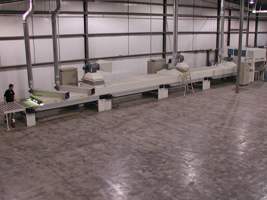 Superfici Compact UV Paint Line: The cutting edge of the "green" movement, this automated finishing line is designed to spray all types of paint products. It is primarily used to spray water borne UV paint that is environmentally friendly with no VOC's or HAPS. Due to the robotic spray system coupled with a reclaim unit, paint yields are increased between 75% and 100%. This is a tremendous savings that is passed directly to our customer. Best of all it enables us to produce a "green" product helping to ensure a cleaner environment for generations to come.
